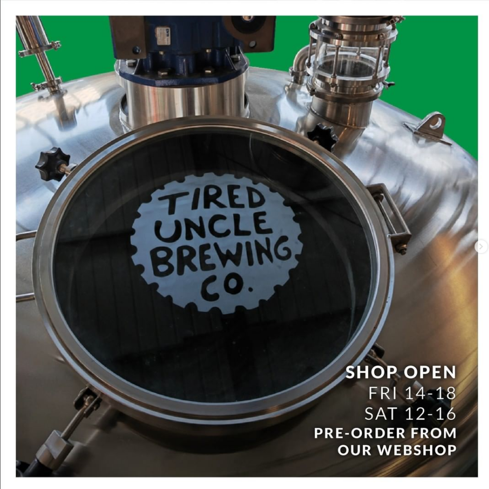 Brewery tank with Tired Uncle's logo